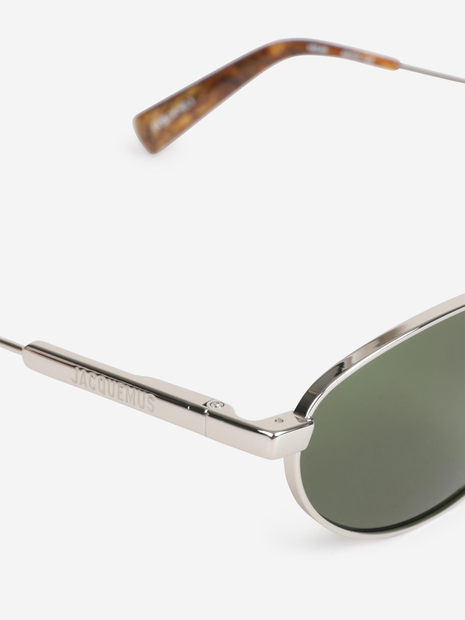 Outlet online Jacquemus Mujer Gafas de Sol Ovaladas color Marrón sku 860-001190 02 - Foto 4