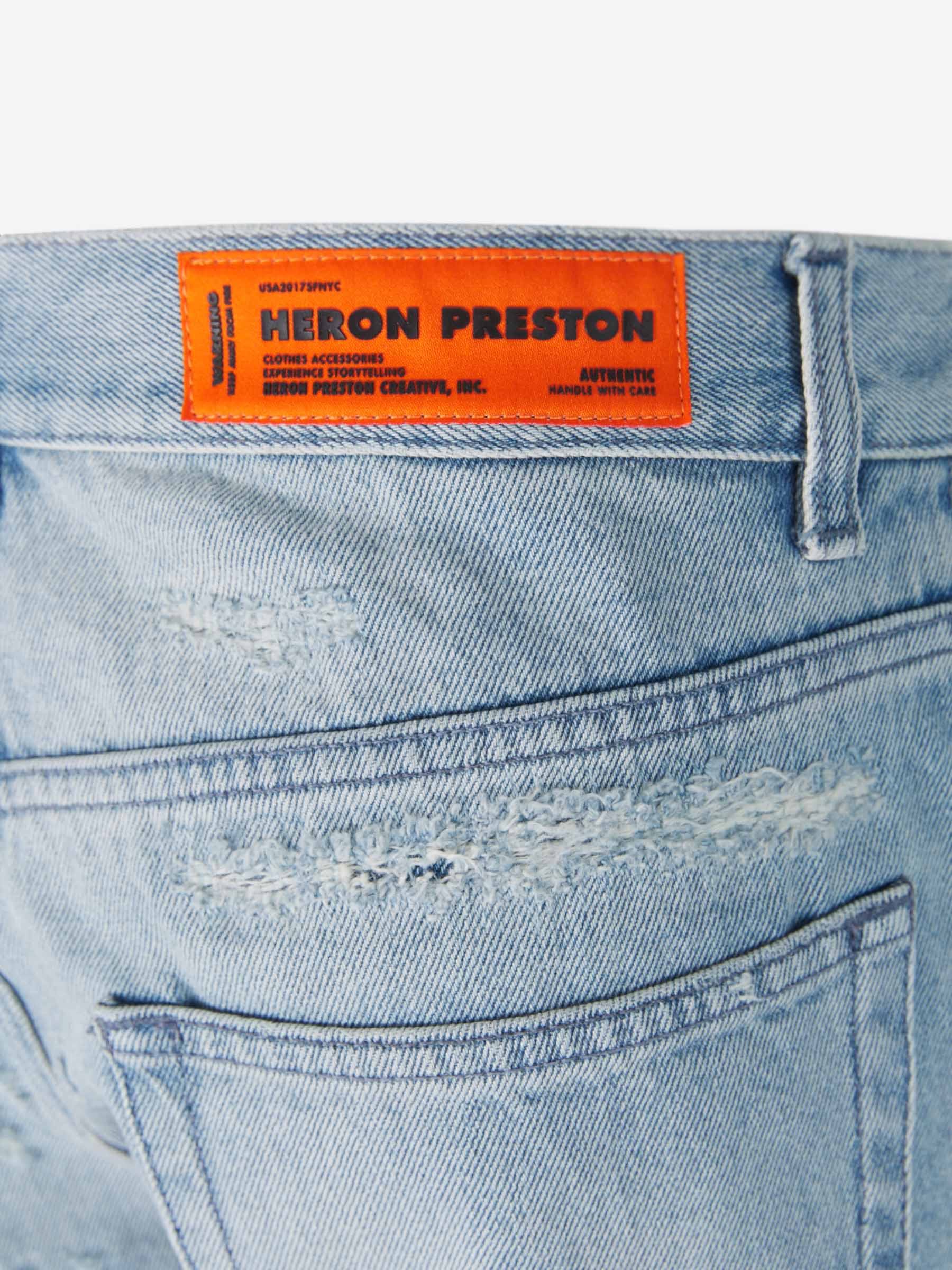 Heron Preston Jeans Anchos Desgarrados color Azul Denim sku 522-002307 01 - Foto 5
