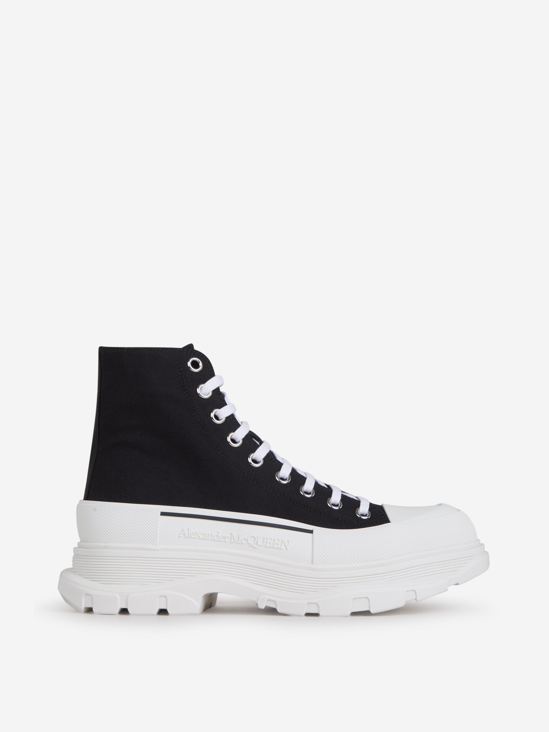 Outlet online Alexander McQueen Hombre Sneakers Tread Slick Altas color Negro sku 611-003957 01 - Foto 1