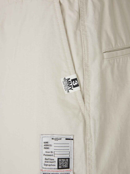 Outlet online Maison Mihara Yasuhiro Hombre Pantalones Parachute color Blanco sku 521-003465 01 - Foto 4