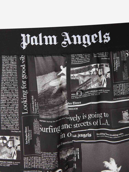 Outlet online Palm Angels Hombre Bermudas Estampado Periódico color Negro sku 523-001205 01 - Foto 4