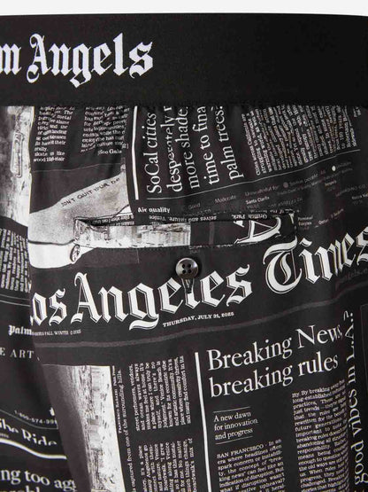 Outlet online Palm Angels Hombre Bermudas Estampado Periódico color Negro sku 523-001205 01 - Foto 5