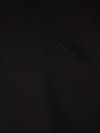Outlet online Alexander McQueen Hombre Polo Algodón Bordado color Negro sku 552-001431 01 - Foto 4