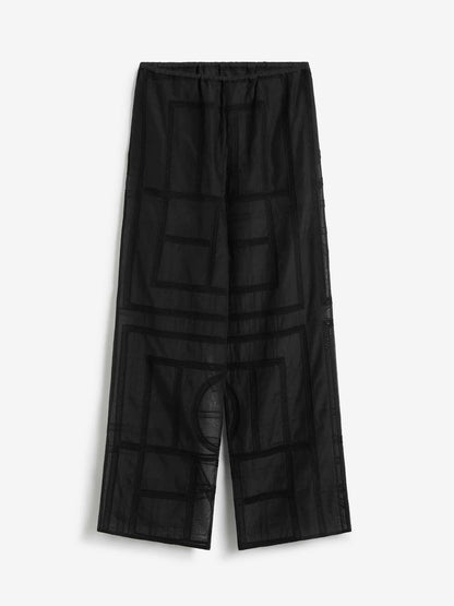 Outlet online TOTEME Mujer Pantalones anchos color Negro sku 761-003870 01 - Foto 1