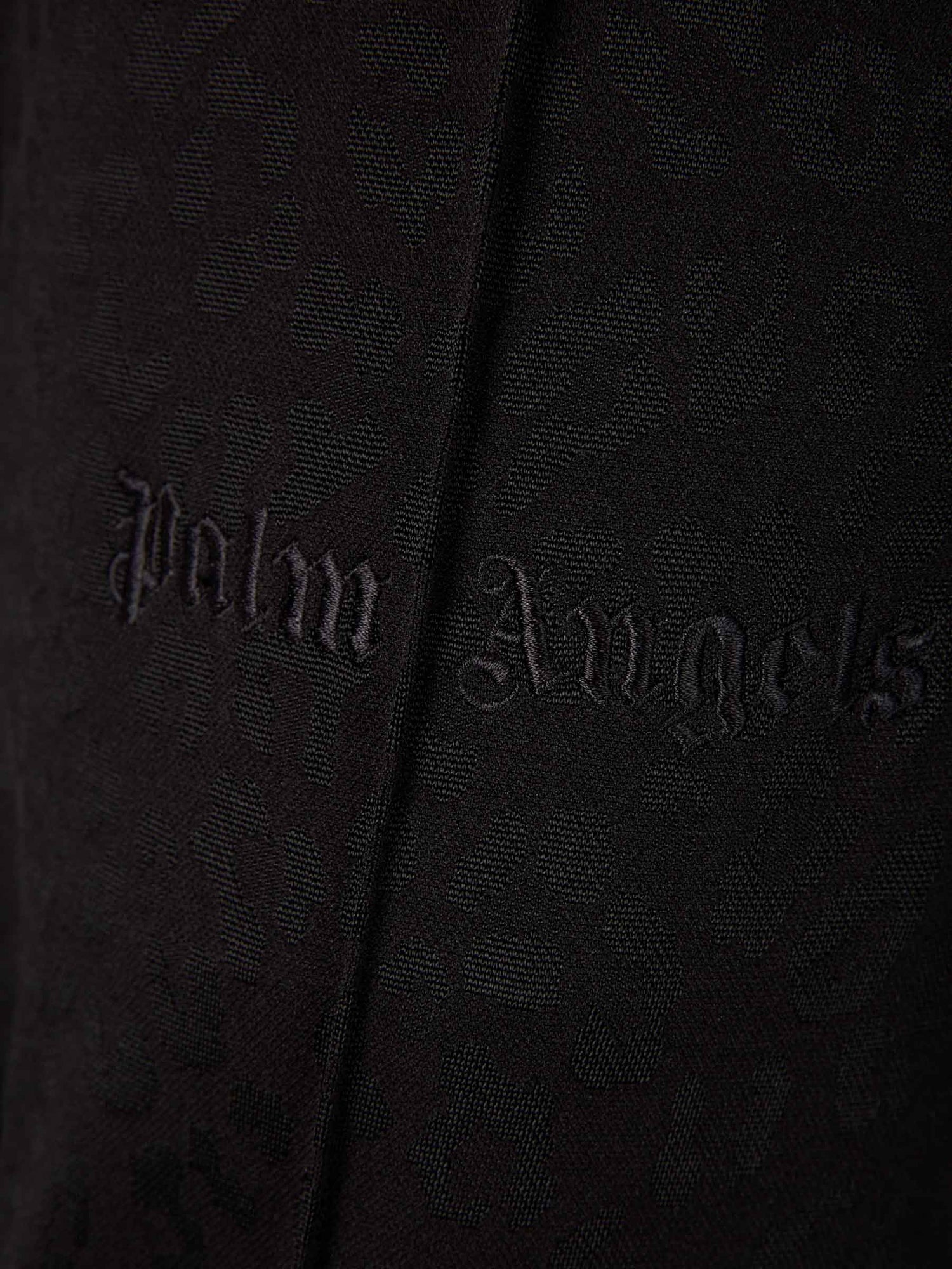 Palm Angels Joggers Motivo Leopardo Tonal color Negro sku 322-000411 01 - Foto 5