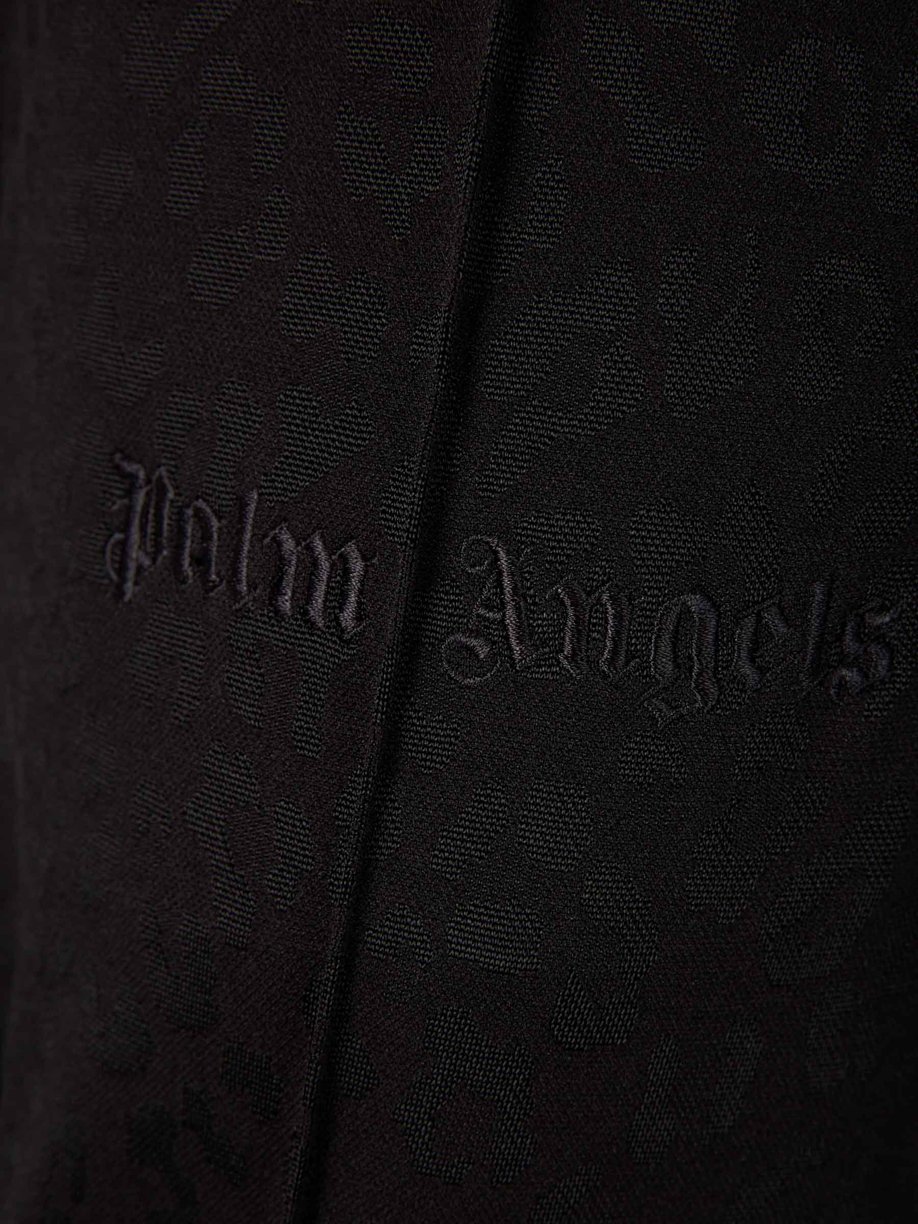 Palm Angels Joggers Motivo Leopardo Tonal color Negro sku 322-000411 01 - Foto 5