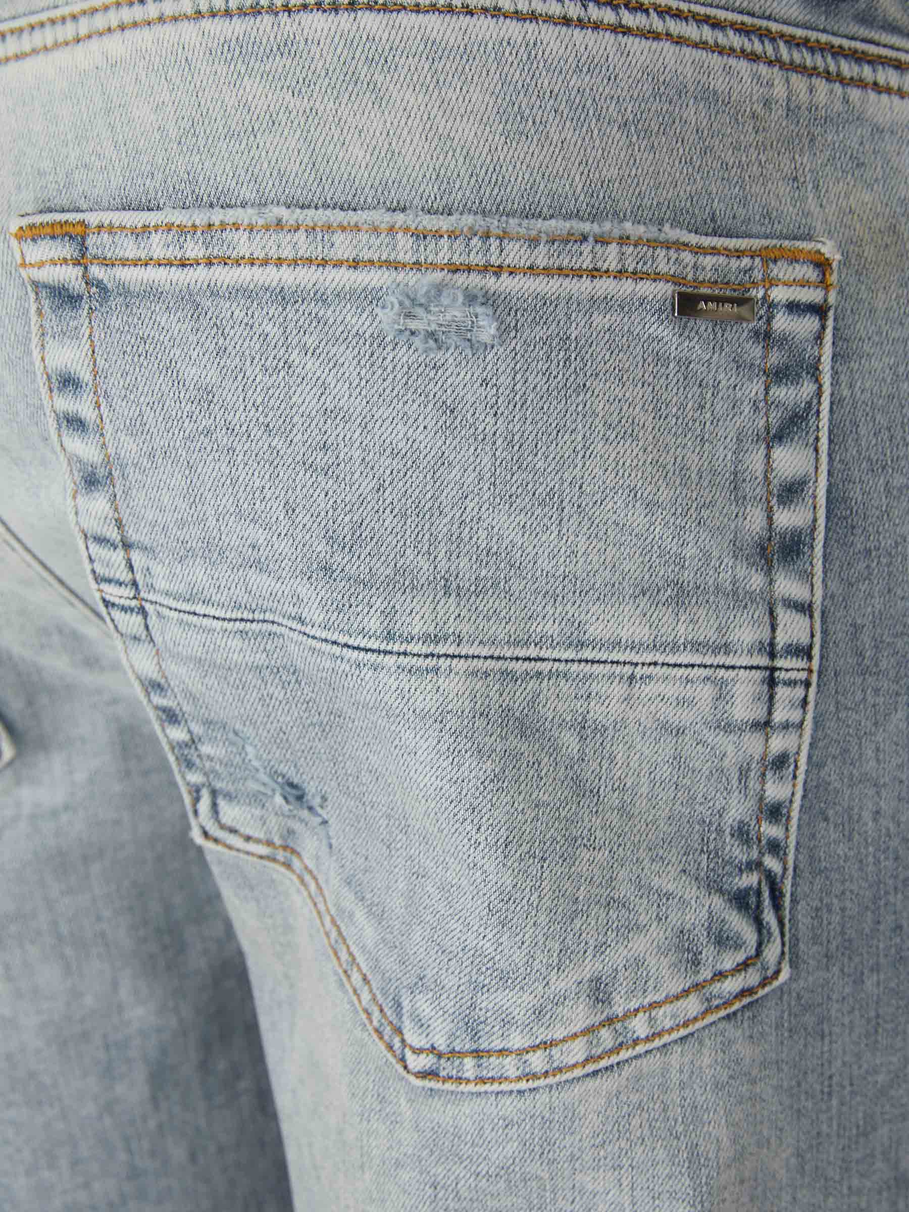 Amiri Jeans Distressed Contraste color Azul Denim sku 522-002385 01 - Foto 4