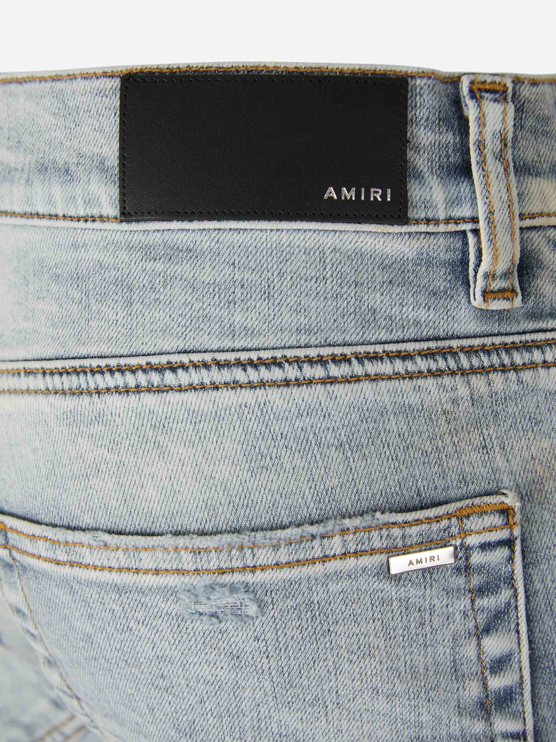 Amiri Jeans Distressed Contraste color Azul Denim sku 522-002385 01 - Foto 5