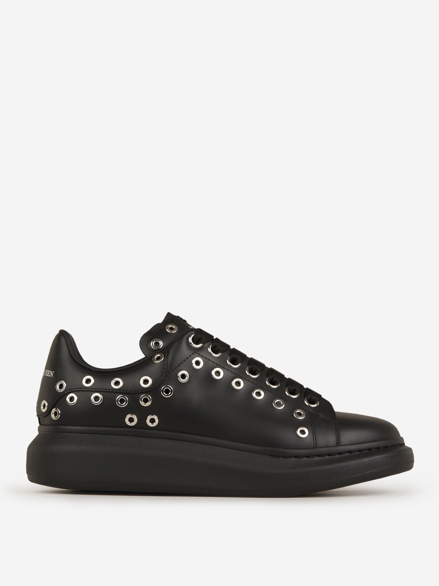 Outlet online Alexander McQueen Hombre Sneakers Oversized Ojales color Negro sku 616-002219 01 - Foto 1